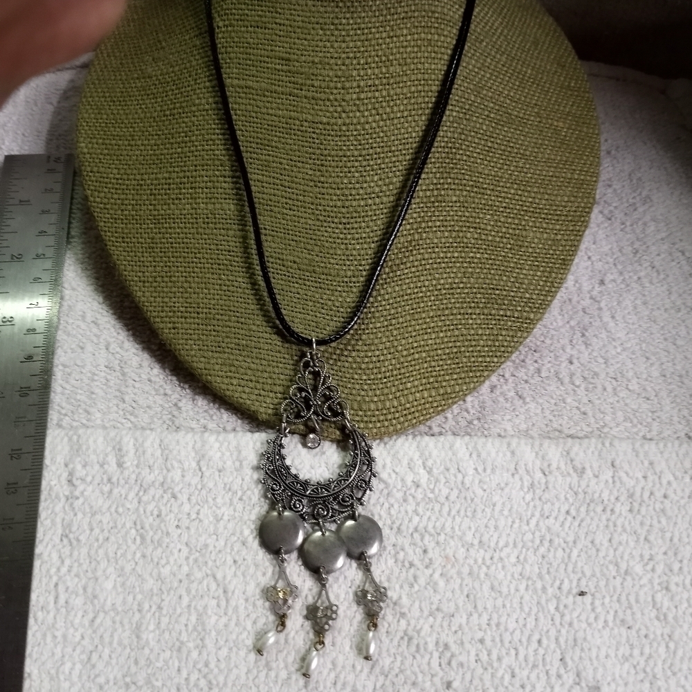 Silvertone Crystal faux pearl dangle charms necklace black cord